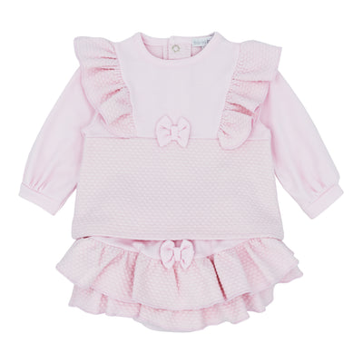 This Blues Baby branded girls two-piece set features a charming pink frilly top and jam pants. Perfect for the autumn/winter season, it comes in sizes ranging from 3 months to 4 years old. Give your little one a stylish and comfortable outfit with this adorable set.