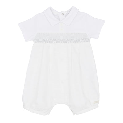 This new arrival from the Blues Baby spring summer collection is perfect for your little boy. The white and with grey colour combination adds a touch of style, while the smocked design provides a comfortable fit. Available in sizes 3 months up to 9 months.