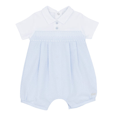 This boys blue &amp; white smocked romper from Blues Baby is a stylish addition to your little one's wardrobe. Perfect for spring and summer, this short sleeve romper features a classic smocked design and collar detail. Available in sizes 3 months to 9 months.