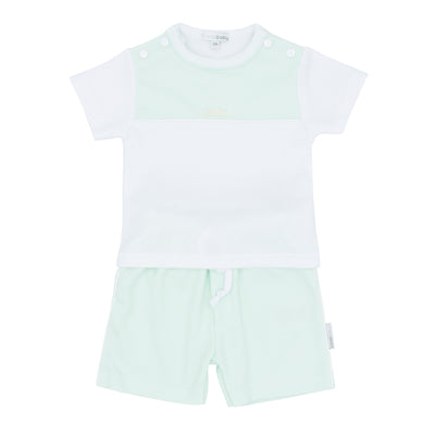 Explore our new collection for boys, featuring the perfect coordinating outfit for brothers of all ages. This two piece top and shorts set from Blues Baby is a must-have for the spring and summer season. The short sleeve white t-shirt boasts a round neck and a stylish mint green box design, accented with buttons on the shoulder. The matching mint green shorts feature a sleek white piping design on the sides, as well as convenient pockets and an elasticated waistband. Available in sizes 3 months to 4 years.