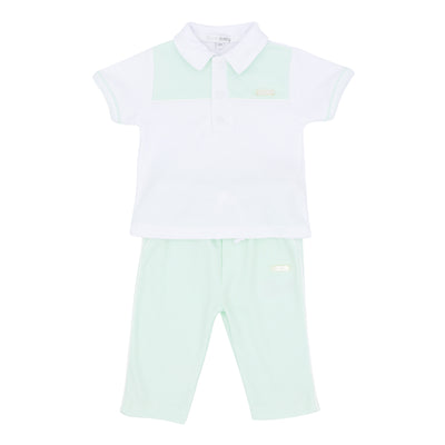 Experience unmatched style and comfort with this polo shirt and trouser set for boys by childrenswear brand Blues Baby. The unique mint green box design on the short-sleeved polo shirt is complemented by a button fastening collar, while the mint green trousers feature white piping detail and an elasticated waistband for a touch of sophistication. Available in sizes for 3 months up to 4 year olds, this set is perfect for any occasion and ideal for matching siblings.