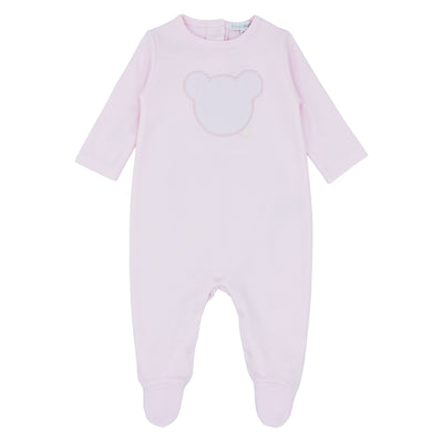 This babygrow from Blues Baby features a delicate pink colour and adorable bear appliqué on the front and on the back. The round neck collar has a push button fastening for convenience. Available in newborn, 1m, and 3m sizes, it is made from 100% cotton.