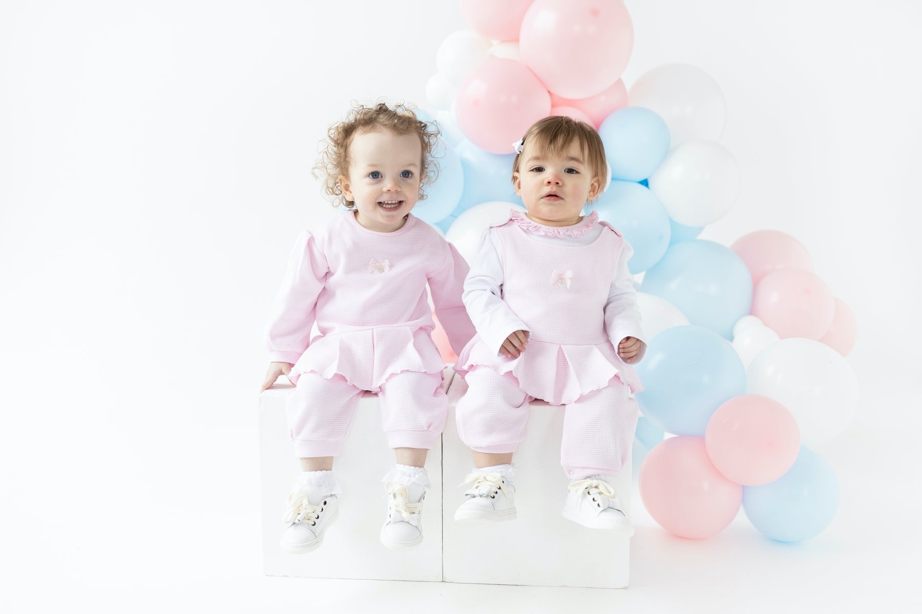 Designer girls’ pink two-piece jog set, long sleeve top with bow, matching leggings, 3m–4yr