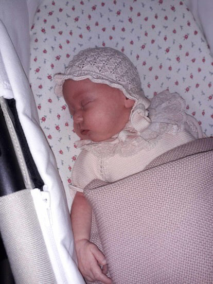 Happy child wearing Mac Ilusion outfit, showcasing adorable Spanish boutique baby clothing.