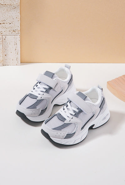 <p data-mce-fragment="1">Introduce your little girl to the latest fashion trend with our girls grey chunky sole fashion trainers. Designed by Rock &amp; Joy, these trainers feature a chunky sole and velcro strap for easy fastening. Perfect for spring and summer, these designer inspired trainers will keep her stylish and comfortable.</p>