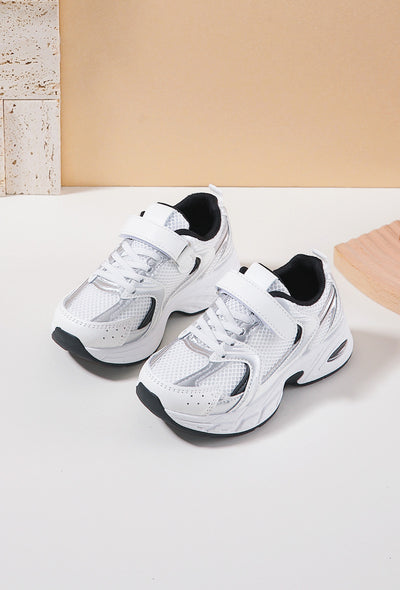<p data-mce-fragment="1">Introduce your child to the latest fashion trends with our designer-inspired white and black chunky sole fashion trainers from our spring summer collection. The chunky sole provides both style and comfort, while the shoe lace fastening with velcro strap ensures a secure fit, suitable for both boys and girls alike. Upgrade their shoe game with these sleek trainers.</p>