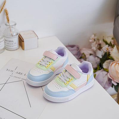 <p data-mce-fragment="1">Enhance your little girl's summer style with our Rock &amp; Joy branded trainers. With a crisp white base and a pop of multi pastel colours, these lace-up trainers will add a touch of fun to any outfit. The velcro strap ensures a secure fit, while the lightweight design makes them perfect for all-day wear.</p>