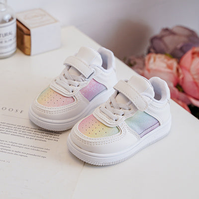 <p data-mce-fragment="1">Introducing our Rock &amp; Joy branded girls white rainbow lace up trainers. Part of our spring summer collection, these trainers are not only stylish but also practical with easy-to-use velcro fastening. Perfect for adding a pop of colour to any outfit.</p>