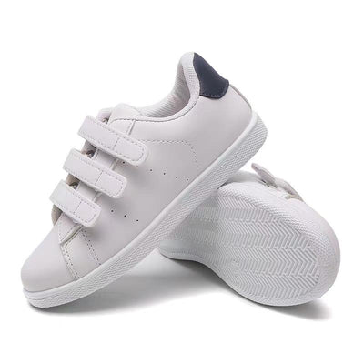 <p data-mce-fragment="1">Expertly crafted for active young boys, these boys white &amp; navy blue velcro strap trainers from our spring summer collection provide both style and functionality. With a sleek white design accented by navy blue detail on the back and a convenient velcro fastening, these trainers are perfect for all day wear. Experience the quality of Rock &amp; Joy branding with every step.</p>