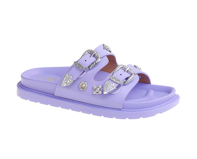 <p data-mce-fragment="1">These Doremi branded girls purple buckle sliders are the perfect addition to any summer wardrobe. With a stylish buckle design and vibrant soft purple colour, these sliders are not only on-trend, but also comfortable and versatile. The ultimate holiday shoes for any fashion-forward girl!</p>