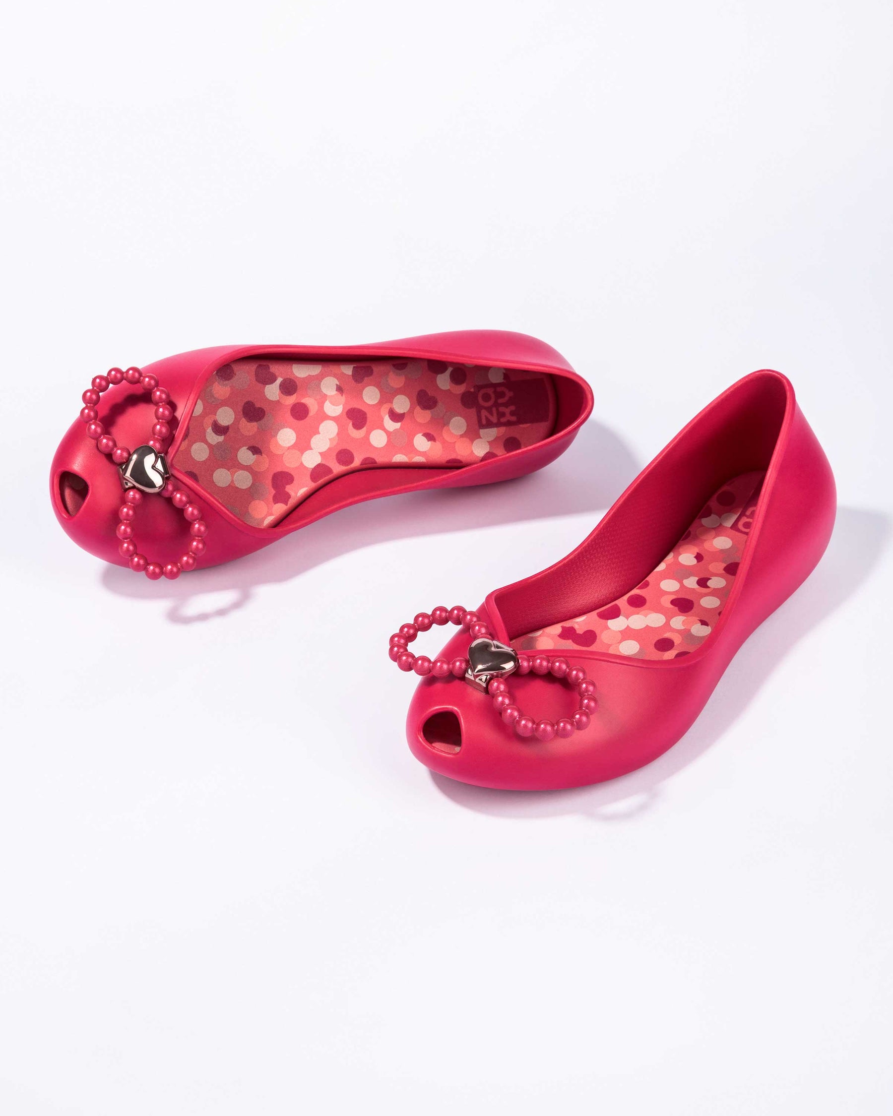 Zaxy branded girls fuchsia pink slip on vegan friendly shoes