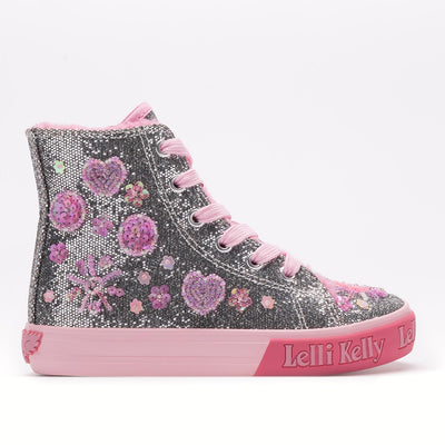 Elevate your girls fashion statement with these Lelli Kelly branded dafne flat Hi Top baseball ankle trainers. The pewter silver glitter and pink beading design, along with a pink&nbsp;fleece lining give these shoes a unique touch. Featuring easy-to-adjust laces and an inside zip for a perfect fit, these trainers also have a non-slip sole with logo and cushioned insole, ensuring maximum comfort. Plus, each pair includes a complimentary Lelli Kelly gift. Available in toddler sizes as well.

Please note that 