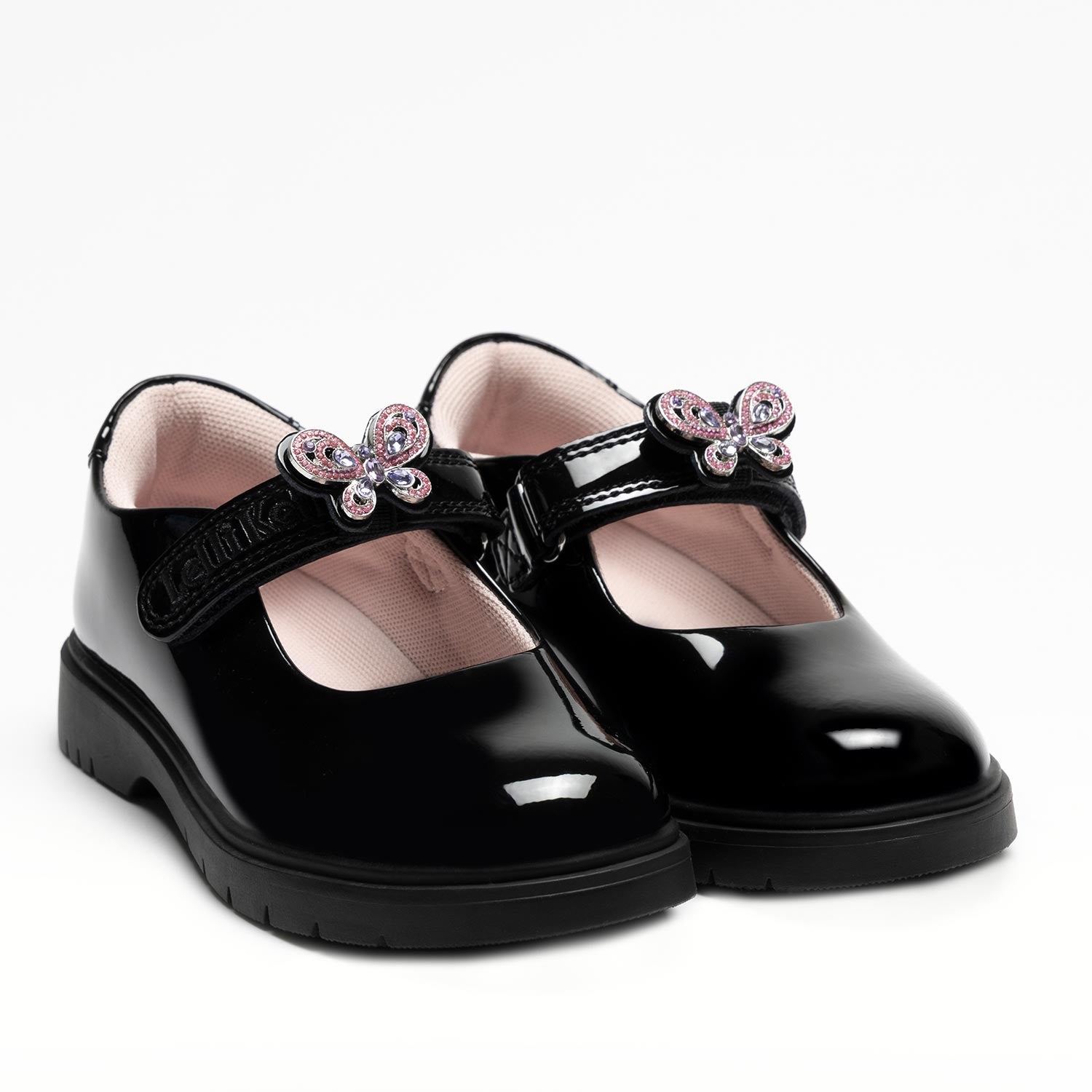 Close-up of pink and lilac diamanté butterfly detail