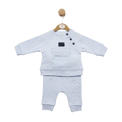 This boys blue two piece sweatshirt & jogger set from Mintini Baby is perfect for your little boy. The set consists of a sweatshirt and joggers with navy blue button detailing and a pocket to the front. Available in sizes 3 months to 24 months.