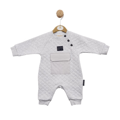 Keep your baby boy looking sharp with this stylish Mintini Baby romper. Crafted from a comfortable, lightweight grey fabric, this piece features navy blue three button detail to the front, a pocket in the middle, and open feet. Available in sizes from 3 months up to 12 months.