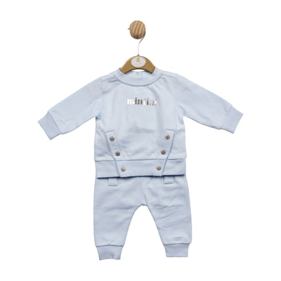 This stylish two-piece jogger set from Mintini Baby is perfect for your little one. With a long sleeve sweatshirt and trousers to match, this set is available in sizes from 3 months to 24 months and features a classic blue colour with subtle silver button detail. Your little boy will be ready for any occasion in this stylish, branded outfit.