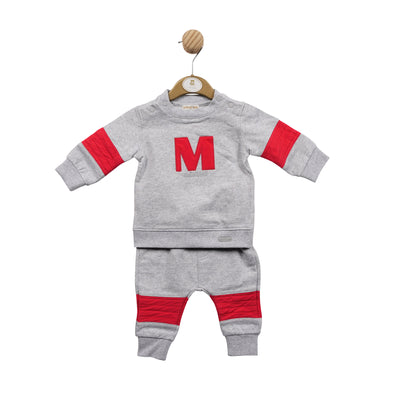 Boys Grey With Red Two Piece Sweatshirt & Jogger Set from luxury childrens boutique brand Mintini Baby. This stylish two piece set features a sweatshirt with an M design to the front and a pair of joggers, available in sizes 3 months to 24 months. Keep your little one looking great with this trendy set.