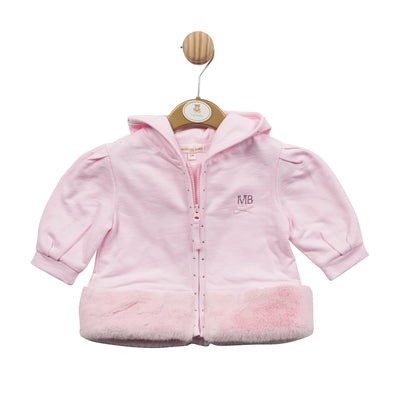 This girls pink jacket from Mintini Baby is an elegant way to keep your baby warm. Crafted from a cotton blend fabric with a hood, zip fastening, and fur trim around the bottom, it features a unique fur heart detail on the reverse for added flair. Available in sizes 3-24 months.