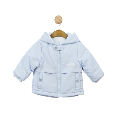 This Mintini Baby branded lightweight hooded coat in blue is the perfect choice for your little boy during the spring and summer seasons. It's available in a range of sizes, from 3 months to 5 years old, and promises a comfortable fit. Keep your child stylish and protected from light weather with this must-have coat. It has pockets on either side, and has a zip fastening.
