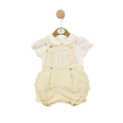 This lemon smocked top and bloomer dungaree set for girls is a must-have for spring/summer season. The intricate smocked design and delicate ruffle detail on the back exude elegance. Cute small yellow bow detail to the arms. Available in sizes ranging from 3 months to 24 months. Stand out with this charming set.