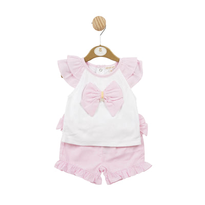 This summer, dress your little girl in style with our Mintini Baby branded two-piece set. The white and pink striped shorts and top feature a large bow and puffy shoulders for a cute and trendy look. Available in sizes 3 months to 5 years, it's perfect for sisters to match.