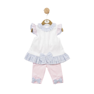 <p>This adorable girls tunic and legging set from childrens boutique brand Mintini Baby is the perfect addition to any little girl's spring and summer wardrobe. The two piece set features a white top with a blue frilly collar and pink and blue frills on the arms, and a matching blue frill around the bottom with a large bow in the middle. The pink leggings with blue bows on the ankle add the perfect finishing touch. Available in sizes 3 months up to 5 years.