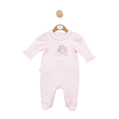 Introducing our girls pink all in one sleepsuit, perfect for your little ballerina! This Mintini Baby creation features a delicate pastel pink colour, frilled round neck collar, and a ballerina shoe design with sparkling diamante detail. The frill detail on the back add extra charm. Available in sizes 1 month to 6 months.