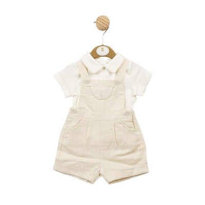 This Mintini Baby boys summer outfit is perfect for your little one. The beige dungaree paired with a white collared shirt is both stylish and comfortable. Available in sizes 3 months to 24 months, this set is sure to keep your baby looking cute and feeling great all summer long.