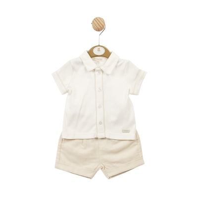 Get your little man ready for summer with this boys beige & cream shorts and shirt set from Mintini Baby. The beige shorts have an elasticated waistband and cream collar shirt provide comfort and style for sizes 3 months to 24 months. The shirt features a button-down front with beige piping detail and short sleeves, perfect for any warm weather occasion.