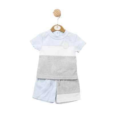Introducing our Mintini Baby branded boys summer outfit in blue, white and grey colour combination. This two piece set includes a round neck top with a button fastening on the reverse, and matching elasticated waistband shorts. Available in sizes 3 months up to 5 years old. Perfect for a stylish and comfortable summer look.