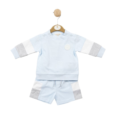 <p>Keep your little boy stylish and comfortable this spring and summer with our Mintini Baby branded boys sweater and shorts set. Available in sizes 3 month up to 24 months, this set features a round neck sweater and elasticated waistband shorts in a classic pastel blue, white, and grey colour scheme. Perfect for any occasion, let him enjoy the warm seasons in style.</p>