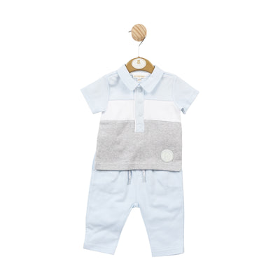 This two piece collared shirt and trouser set by Mintini Baby is perfect for your little boy this spring and summer season. The blue, white, and grey colour combination is stylish and versatile, while the collared shirt with button fastening adds a touch of sophistication. With sizes available from 3 months to 5 years, this outfit is perfect if your looking to match litter brother with big brother.