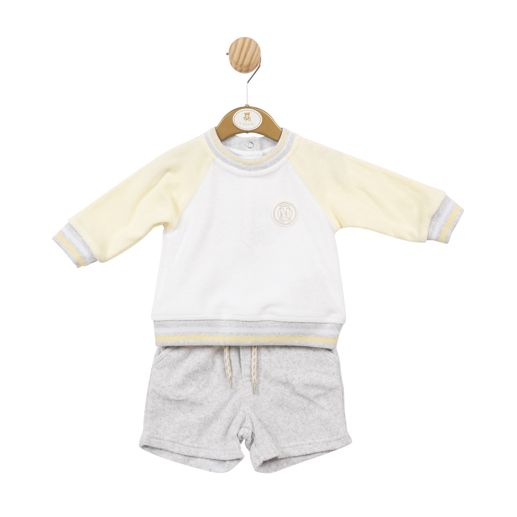 <p>Introducing our boys white, lemon & grey sweatshirt and shorts Set from Mintini Baby's spring summer collection. This two piece set includes a round neck sweatshirt with white and lemon colourblock sleeves and grey shorts to match. Available in sizes 3 months to 24 months. Perfect for your little ones to stay stylish and comfortable this season.</p>