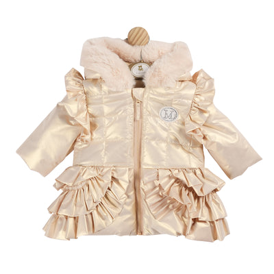 The girls gold winter coat by Mintini Baby is the perfect addition to your little one's wardrobe this season. This new arrival from the autumn winter collection features a luxurious fur hood and elegant ruffle detailing around the shoulder and bottom. With a charming bow detail on the back, this gold coat is available in sizes ranging from 3 months to 5 years old, making it ideal if your looking to match little sister with big sister. Keep your little princess warm, stylish, and ready for any winter adventu