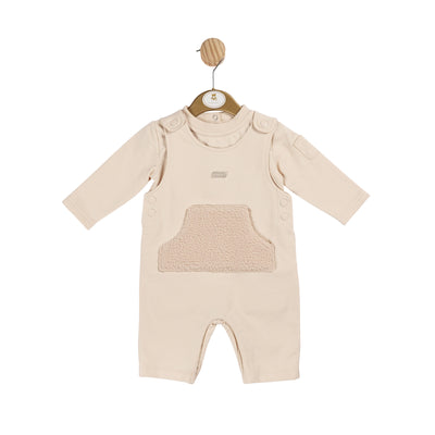 Introducing our Mintini Baby branded boys beige towelling top and long dungaree outfit. This set features a soft towelling detail pocket on the front and back, along with button fastenings on the shoulders for easy dressing. The long sleeve top and open feet legs make this outfit perfect for sizes 3 months up to 24 months.