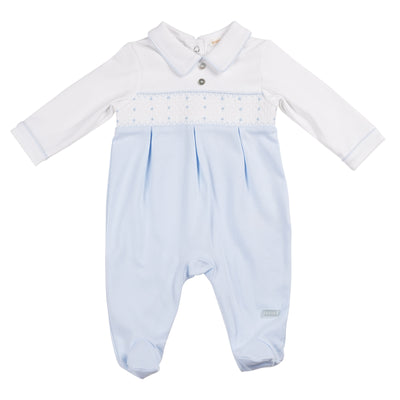 Introducing the boys white &amp; blue smocked sleeper, the classic sleepsuit with a charming smocked design and a sophisticated collar. Made for boys in sizes 1, 3, and 6 months, this Mintini Baby branded piece is perfect for the spring summer season. Crafted with quality and style, it will keep your little one comfortable and stylish.