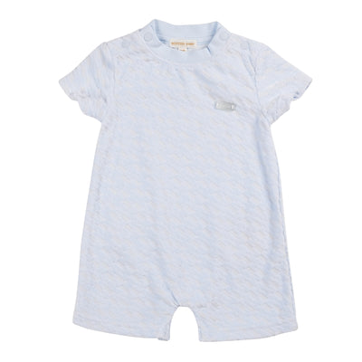 Introducing our latest addition to the Mintini Baby brand - the baby boys classic blue short sleeve romper. A must-have for your little one's spring/summer wardrobe, this romper features a soft towelling fabric making it cool and breathable, finished in a soft pastel blue colour. Available in sizes from 1 month to 12 months.