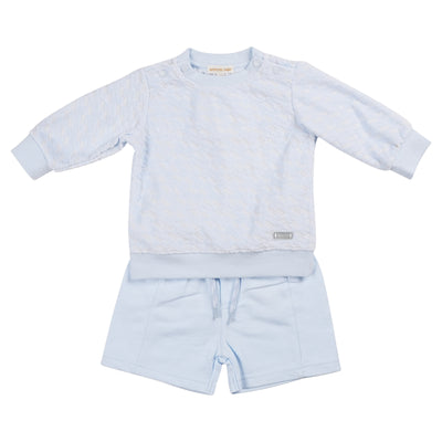 Introducing our Mintini Baby branded boys blue sweatshirt and shorts set! This classic two piece outfit features a drawstring fastening on the shorts for easy adjustments and is available in sizes from 3 months up to 24 months. Stay stylish and comfortable with this must-have set.