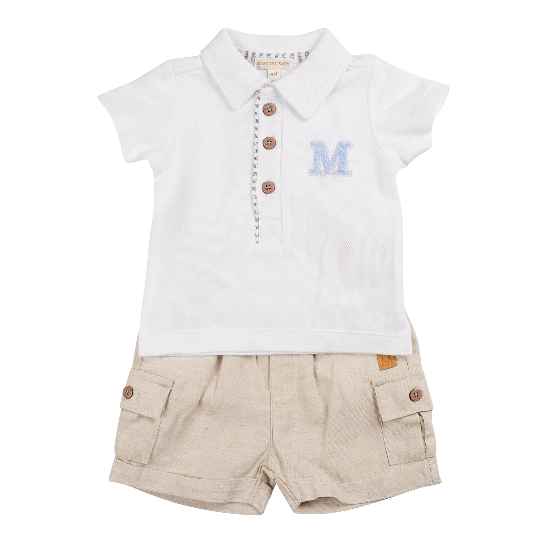 Introducing the Mintini Baby two piece polo shirt & shorts set for boys. This stylish and comfortable set includes a white polo shirt with subtle sage detailing and a beige shorts with cargo-style pockets. Perfect for sizes 3 months up to 24 months, this set is perfect for any occasion.