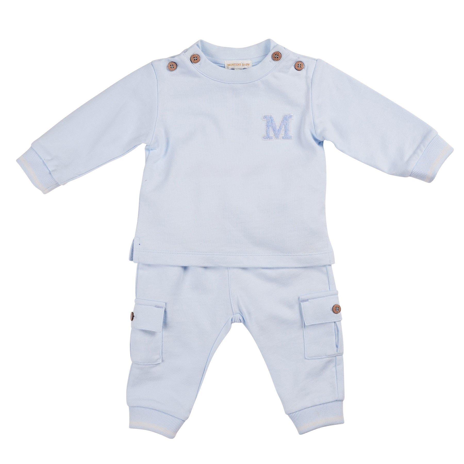 Introducing the Mintini Baby Boys two piece jogger set, part of our spring summer collection. This branded outfit features a long sleeve round neck top and cargo style joggers, perfect for brothers to match. Available in sizes 3 months up to 5 years. Elevate your little ones' style with this trendy and comfortable set.