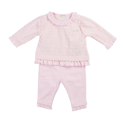 Introducing our new season arrival, the girls pink short tunic top &amp; legging set from childrenswear boutique brand, Mintini Baby. This girls two piece outfit is part of our spring summer collection, and it offers a stylish and comfortable option for your little girl. The pink tunic top features a round neck collar and delicate frill details, while the leggings have an elasticated waistband for a perfect fit. Available in sizes 3 months to 24 months.