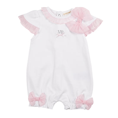 Introducing the perfect addition to your baby's spring and summer wardrobe - the girls white &amp; pink short sleeve romper from Mintini Baby. Made from high-quality materials, this romper features adorable ruffle and bow details, and a convenient push button fastening. Available in sizes 3-12 months.