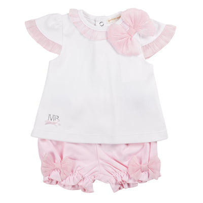 Introducing our new arrival from our spring summer collection, our girls white &amp; pink two piece top and bloomer shorts set by famous baby boutique brand Mintini Baby! This adorable outfit is perfect for your little girl with its white ruffle collar and sleeve detail top, paired with pink shorts that have cute bow accents and an elasticated waistband. Available in sizes 3 months to 24 months.