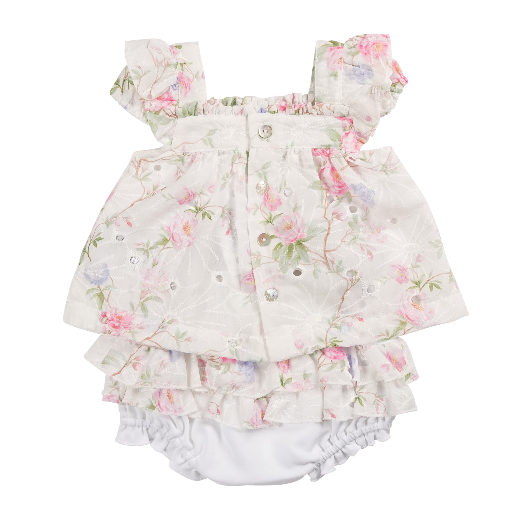 The girls ivory floral two piece top & jam pant set is a stylish and versatile addition to any little girl's wardrobe. Made with a beautiful ivory floral top and white jam pants, this set is perfect for the spring and summer seasons. Available in sizes 3 months to 24 months, and branded by Mintini Baby, your little one will feel comfortable and stylish in this two piece set.