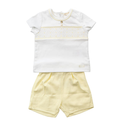 Introducing our new arrival for boys! This two piece set includes a white short sleeve top with a lemon smocking design and round neck collar, paired with lemon shorts with an elasticated waistband. Perfect for Easter and the upcoming spring and summer season. Available in sizes from 3 months to 24 months.