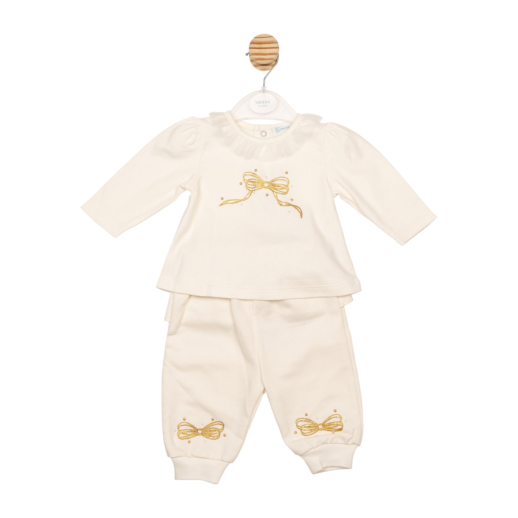 Girls ivory Mintini Christmas two-piece jog pant set with gold bow detail and frill collar – festive boutique outfit