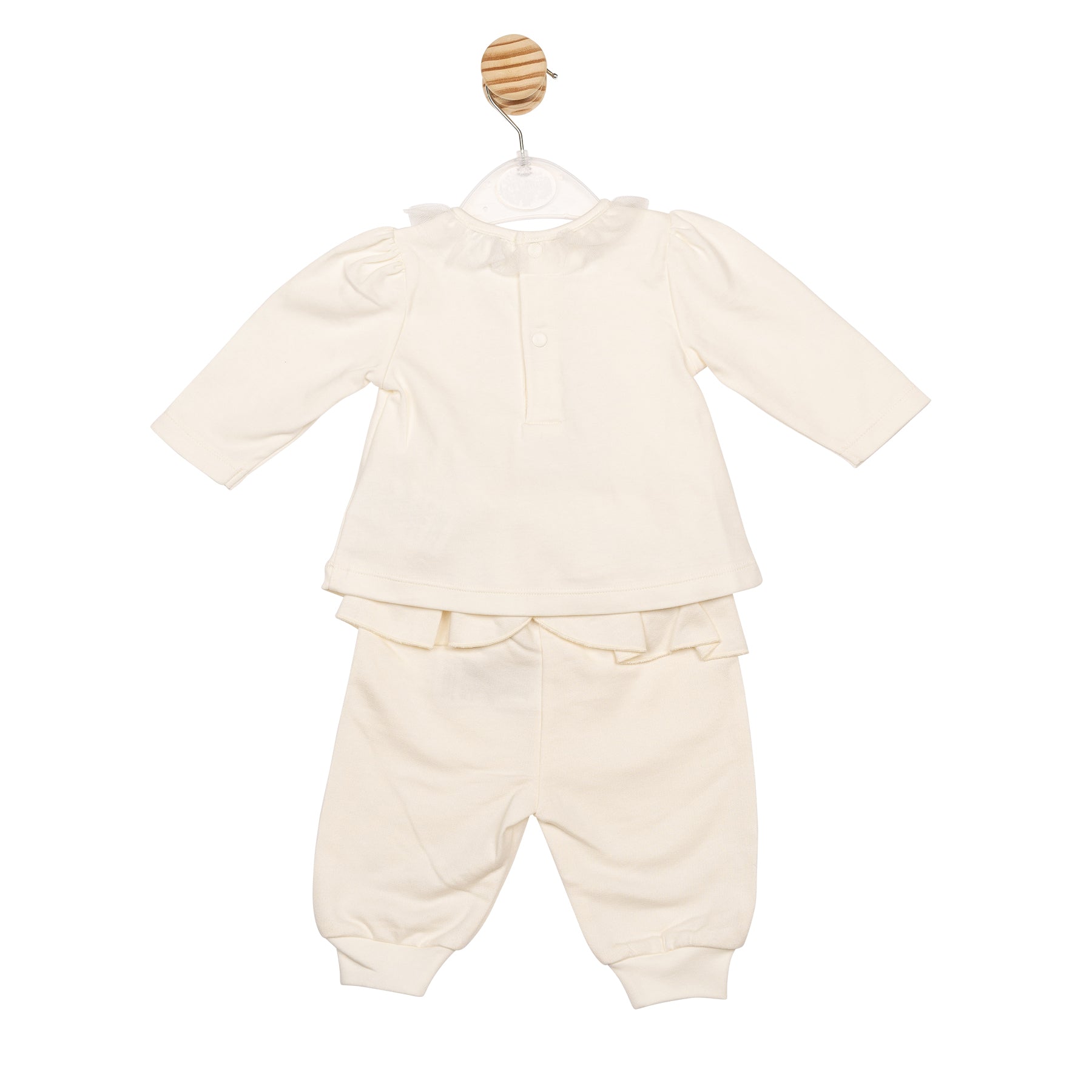 Back view of girls ivory Mintini jog pant set with gold bow detail – British designed boutique Christmas clothing