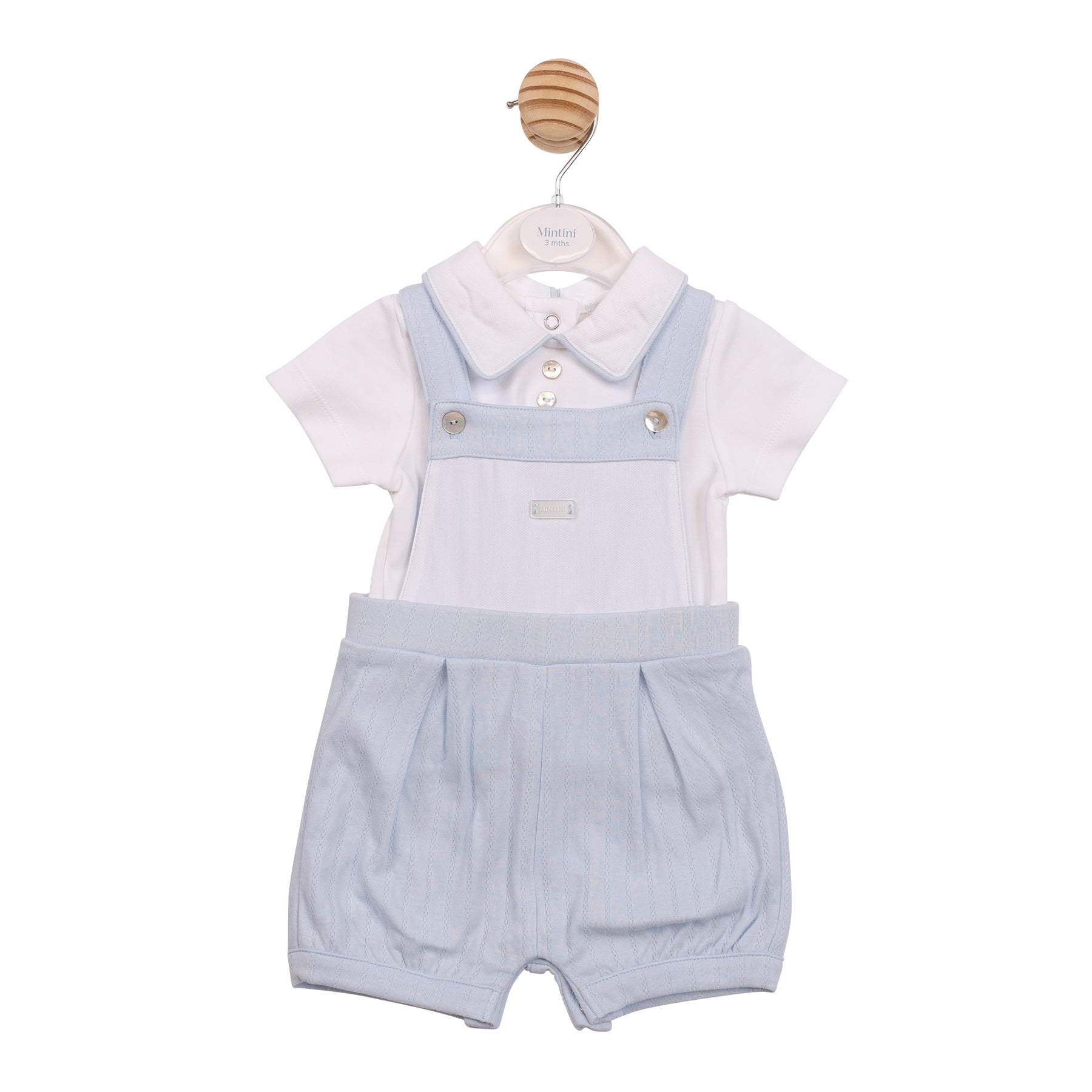 Mintini baby boy white shirt and blue chevron-knit dungaree shorts set.