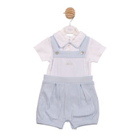 Mintini baby boy white shirt and blue chevron-knit dungaree shorts set.