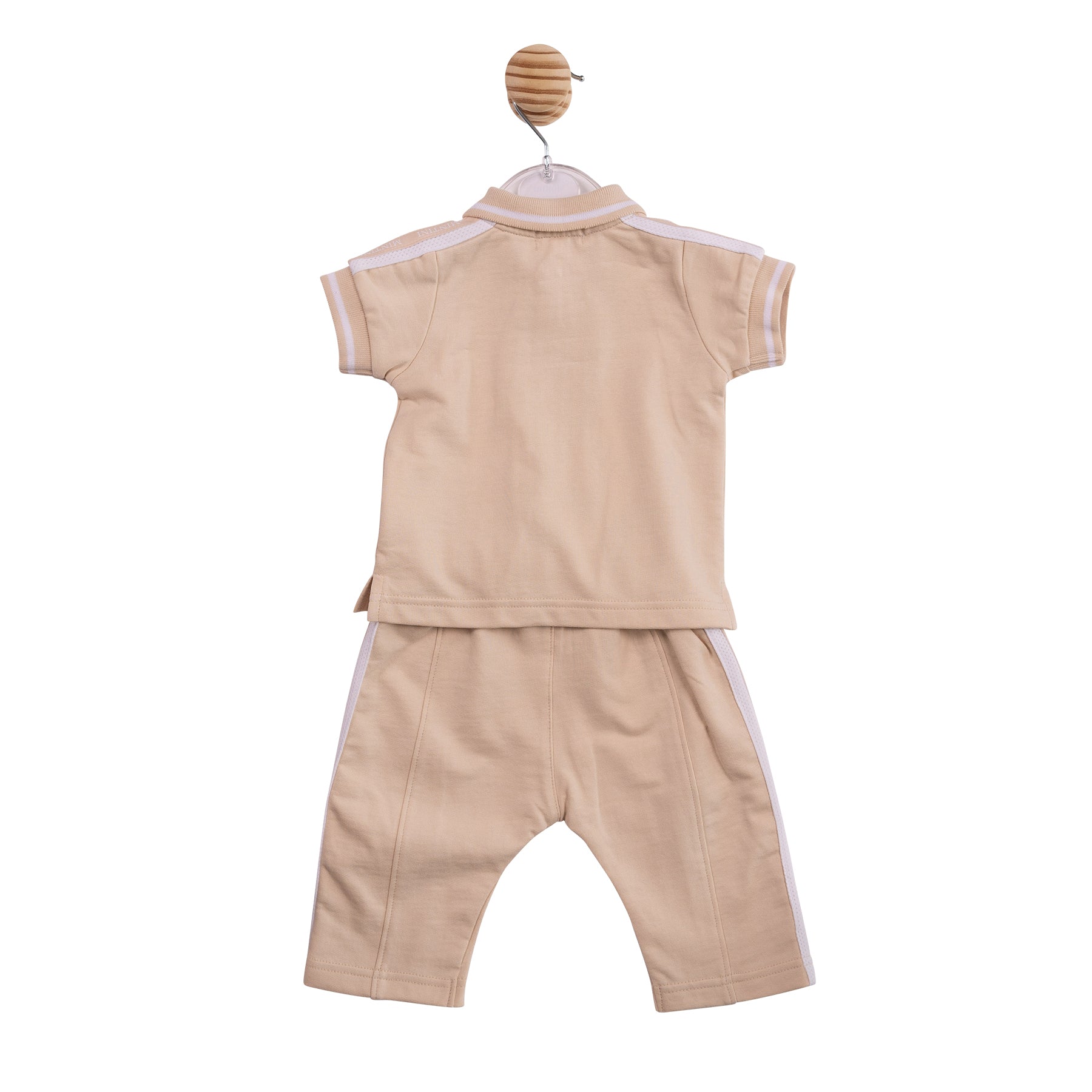 Technical flat lay back view of the Mintini boys beige and white outfit showing the branded shoulder tape and elasticated trousers.